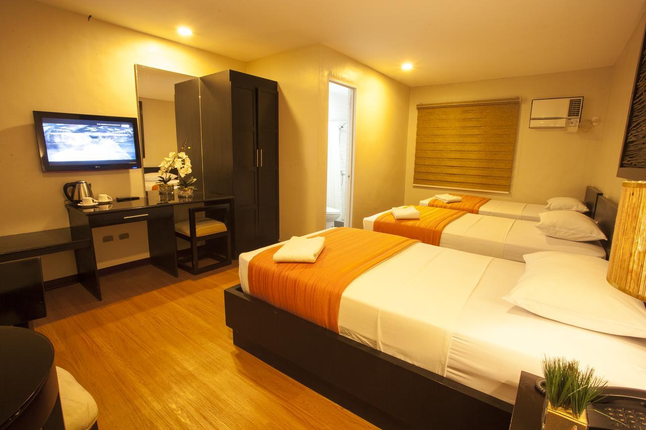 L Square Hotel Tarlac City Экстерьер фото